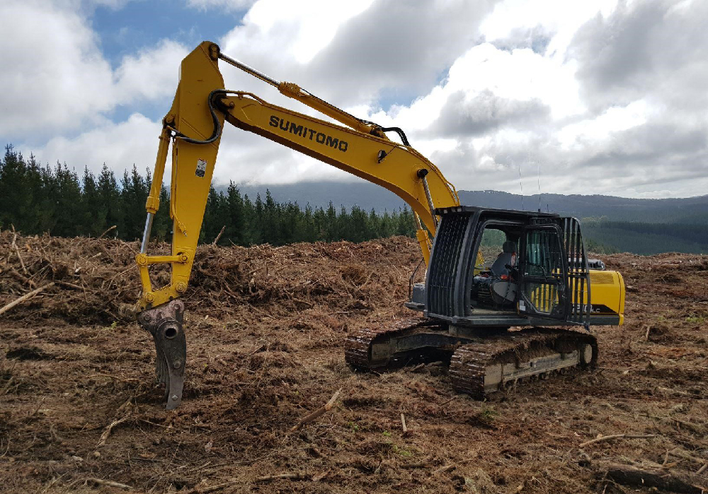 Windrowing machine preps land for planting