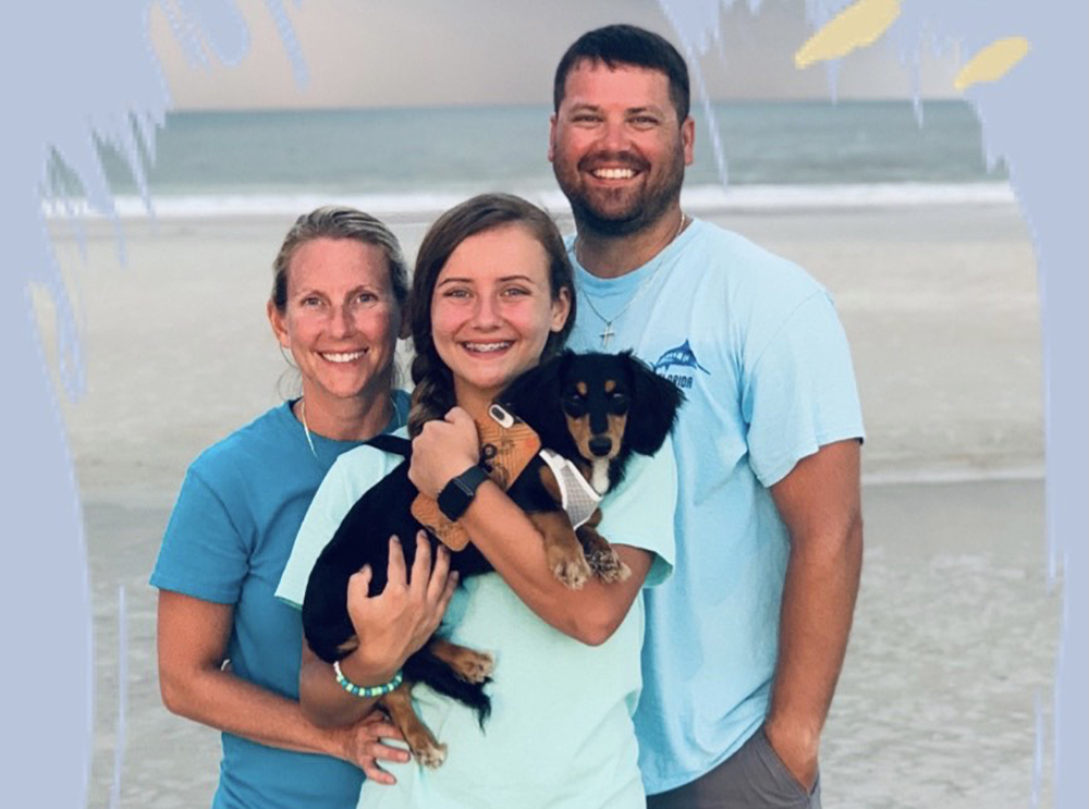 Shane Bergman with wife, daughter and dog